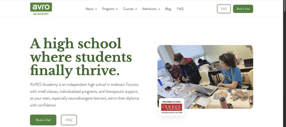 The AVRO Academy homepage after the rebuild, showing the school headline and a classroom photograph